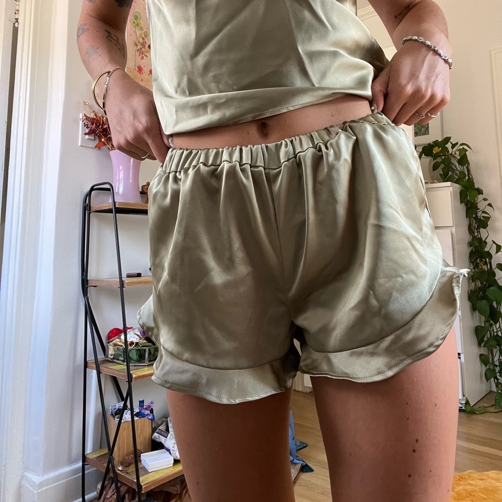 Metallic Green satin pj set with a cami top with adjustable straps and shorts